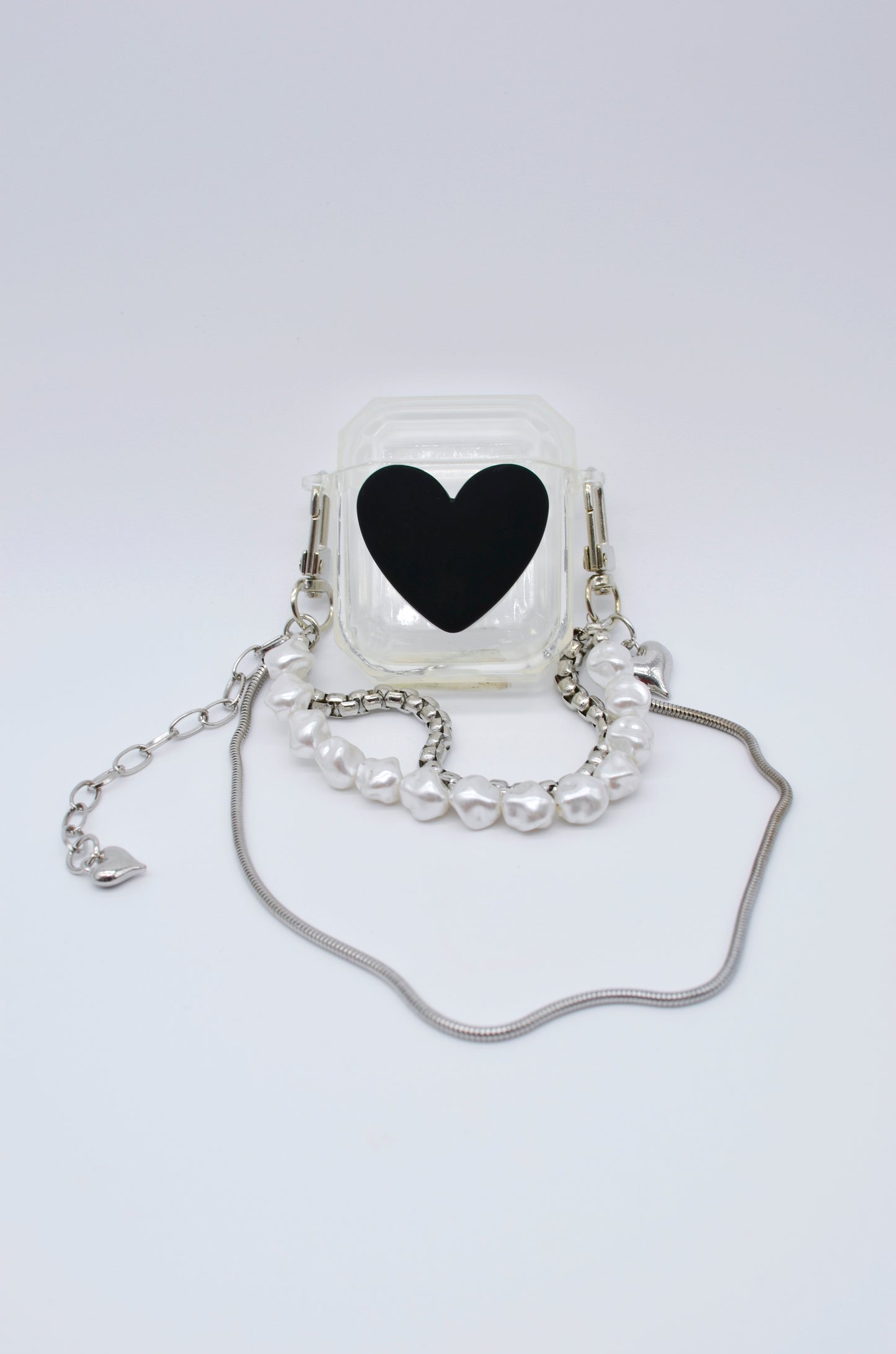 Protector para Airpods transparente con corazón y correa