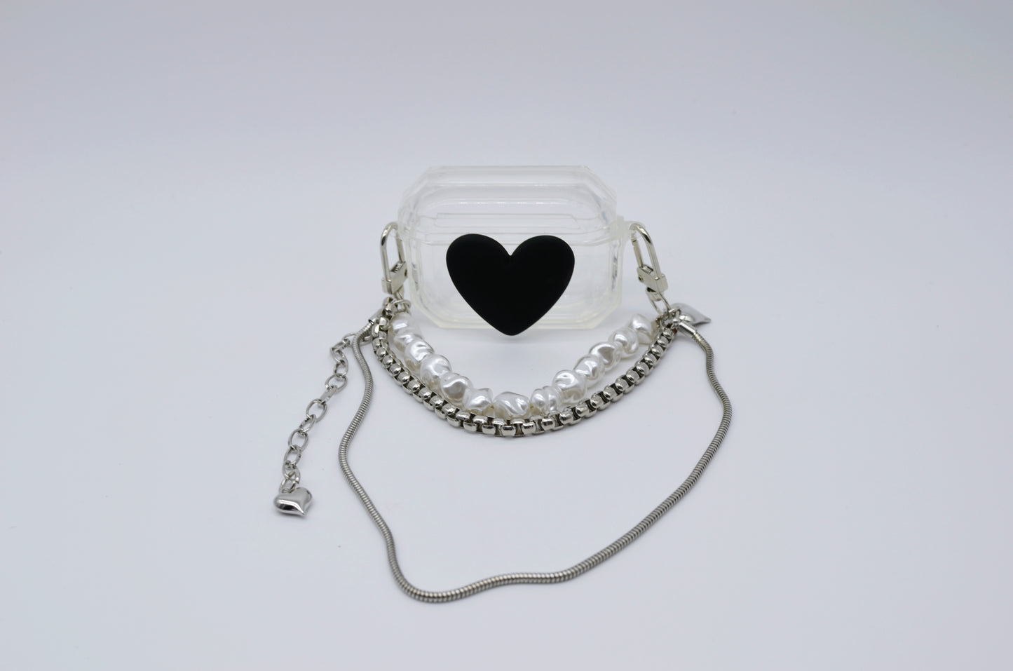 Protector para Airpods transparente con corazón y correa