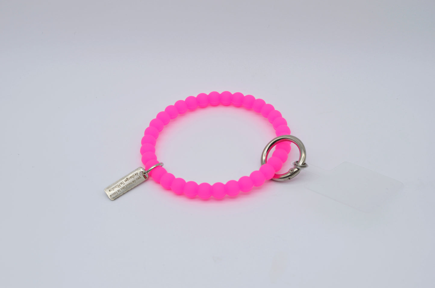 Pulsera de silicón para celular con dije